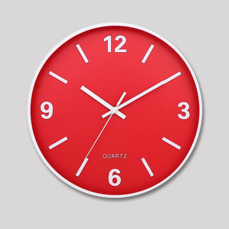 Modern Silent Wall Clock - Densford with a red face, white rim, and silent quartz movement. Features bold hour marks and three white hands, set at ten past ten.