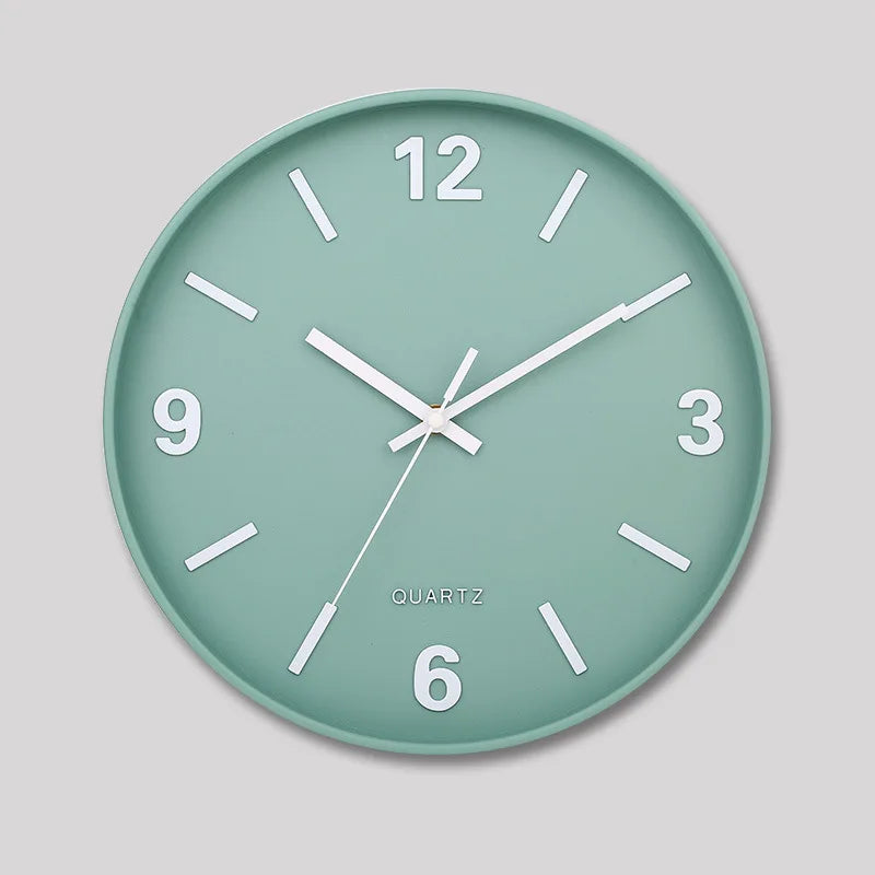Modern Silent Wall Clock - Densford: A minimalist, mint-green quartz wall clock with white hour, minute, and second hands, featuring silent movement. Perfect for enhancing contemporary spaces with its clean, elegant design.
