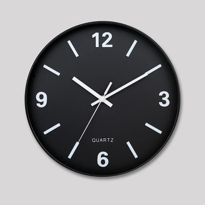 Modern Silent Wall Clock - Densford features a black analog face with white hands and numerals, offering a sleek and noise-free design perfect for enhancing contemporary spaces.