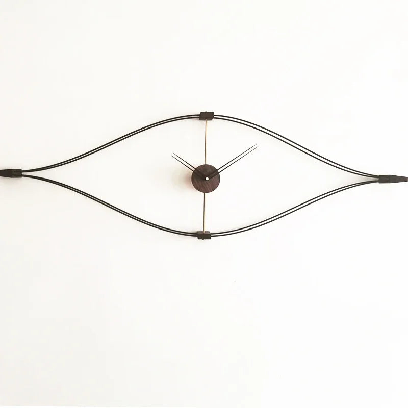 Wall clock back view showing battery compartment and mounting hardware