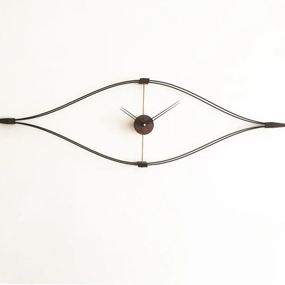 Wall clock back view showing battery compartment and mounting hardware