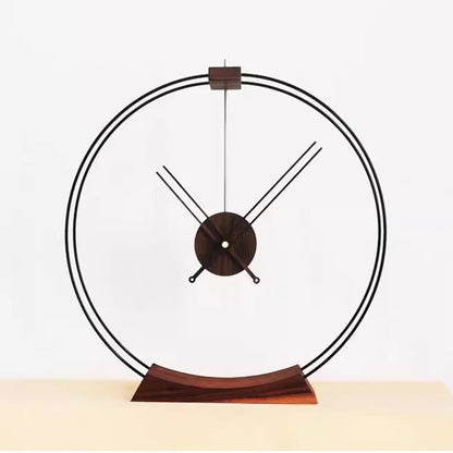 Design table clock - Bexley: A minimalist timepiece with a sleek metal frame and curved wooden base, featuring an open-faced design with wooden-accented hands, perfect for contemporary spaces.