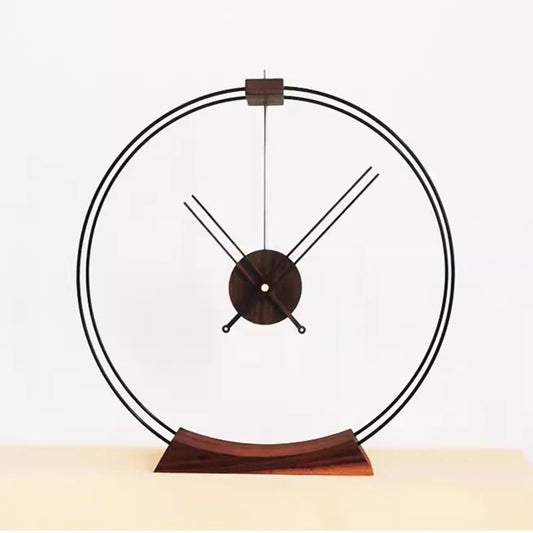 Design table clock - Bexley: A minimalist timepiece with a sleek metal frame and curved wooden base, featuring an open-faced design with wooden-accented hands, perfect for contemporary spaces.