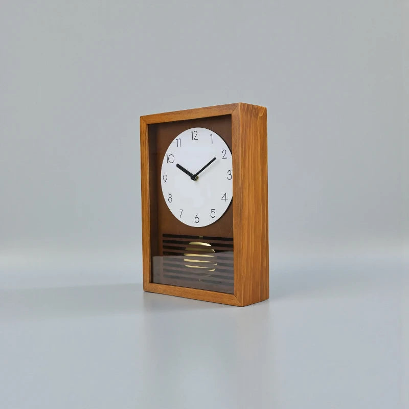 Japanese Wall Clock - Lexton: A minimalist wooden clock with a white dial, black hour markers, and a brass pendulum, embodying mid-century design. Perfect for adding tranquility to any room.