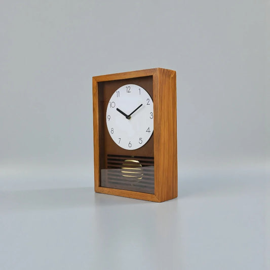 Japanese Wall Clock - Lexton: A minimalist wooden clock with a white dial, black hour markers, and a brass pendulum, embodying mid-century design. Perfect for adding tranquility to any room.