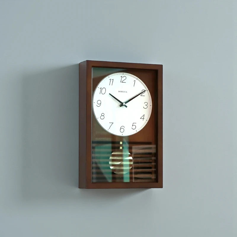 Japanese Wall Clock - Lexton: A classic wall-mounted pendulum clock with a rectangular wooden frame, featuring a round white face with black numerals and slats revealing the swinging pendulum, exuding minimalist elegance.