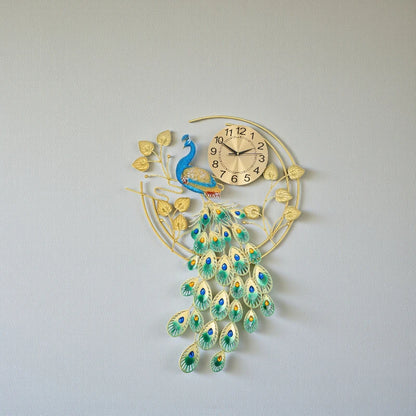 Peacock wall clock - Wexley features a gold-tone frame with a peacock motif, showcasing vibrant tail feathers and shimmering crystals, making it a luxurious focal point for any room.