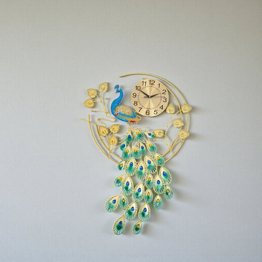 Peacock wall clock - Wexley features a gold-tone frame with a peacock motif, showcasing vibrant tail feathers and shimmering crystals, making it a luxurious focal point for any room.