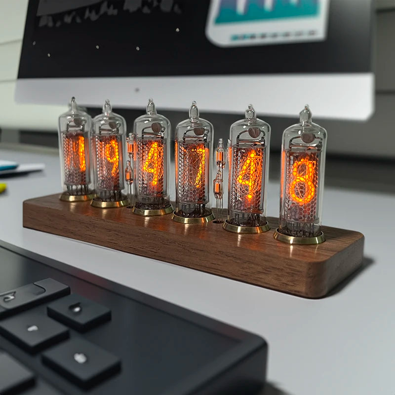 Nixie tube clock - Hartley: A vintage IN-14 Nixie tube clock with six glowing numeric tubes on a wooden base, elegantly combining retro aesthetics with modern design, perfect for any desk or workspace.