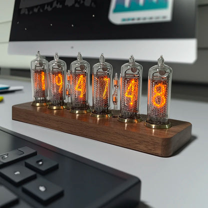 Nixie tube clock - Hartley: A vintage IN-14 Nixie tube clock with six glowing numeric tubes on a wooden base, elegantly combining retro aesthetics with modern design, perfect for any desk or workspace.