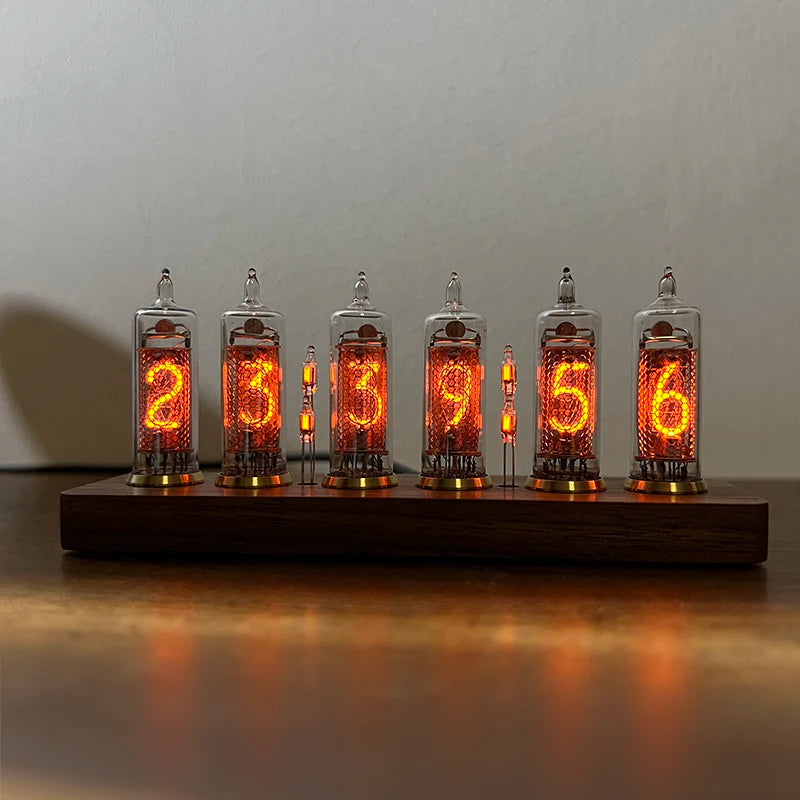 Nixie tube clock - Hartley: A vintage-style clock with six glowing Nixie tubes on a wooden base, displaying 23:39:56, combining Soviet-era tech with modern design for a unique timepiece.