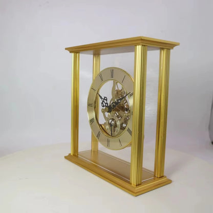 Brass table clock - Braven: A sophisticated mantel clock with a gold frame, glass panels, exposed brass gears, and a Roman numeral face, epitomizing timeless elegance for your desk or mantel.