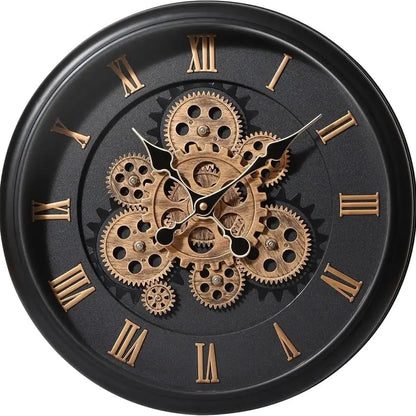 Oversized Wall Clock - Kairos features a steampunk design with a black face, gold Roman numerals, and exposed brass gears. Its distressed black metal frame and moving mechanism add visual intrigue.