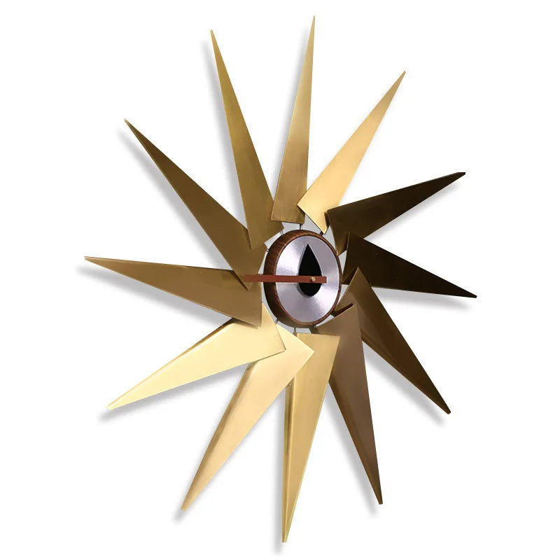 Decorative wall clock with design in gold and bronze on a white background