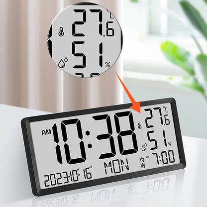 White Digital Clock - Carradon with a large LED display showing time, temperature, humidity, date, and alarm time, ideal for modern spaces. The thermometer and droplet icons highlight indoor climate details.