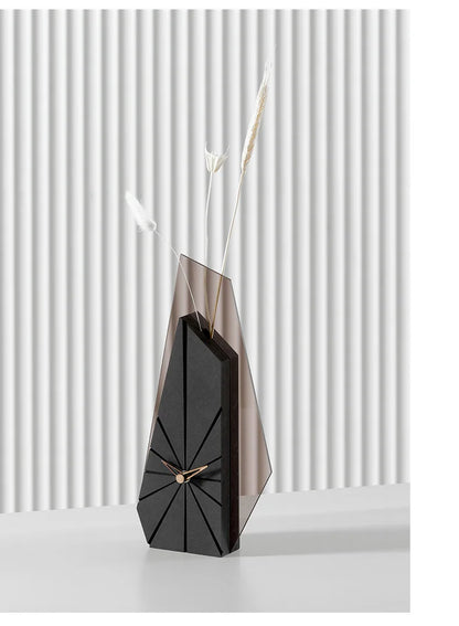Geometric clock as focal point on minimalist white desk in home office