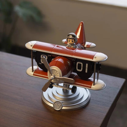 Side view of metal flip clock with dual wing design