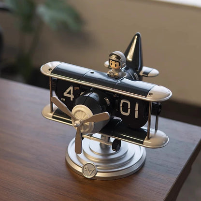 Airplane flip clock in golden brass finish on office desk