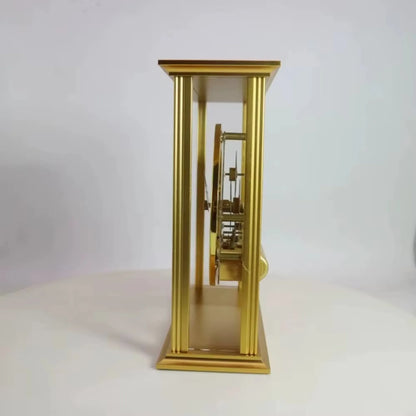Brass table clock - Braven: Side view of a gold-tone mantel clock with exposed gears, mounted between four corner pillars, featuring a polished brass finish and black dial.