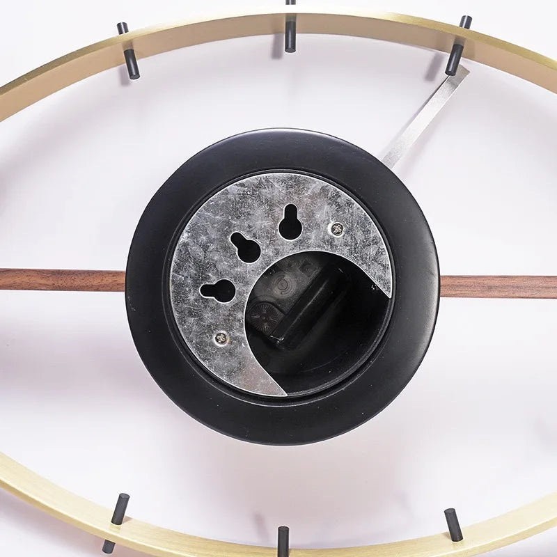 30 inch decorative wall clock - Ashen, showcasing its intricate movement housing, metal mounting plate with key-hole slots, and decorative hour-marking ring, embodying industrial style and vintage charm.