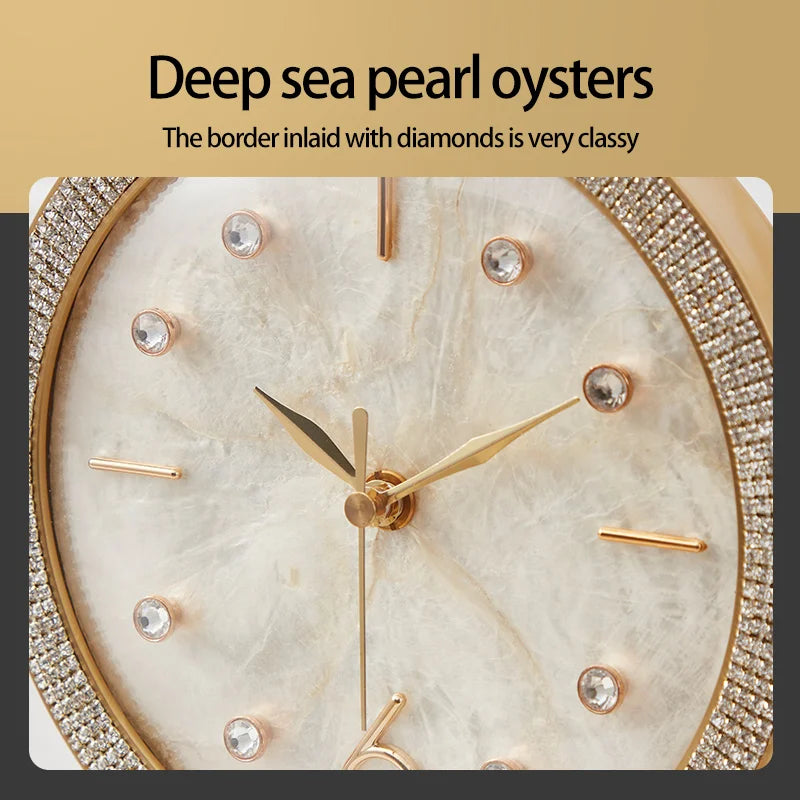 Silent Table Clock - Feynor: Close-up of an analog clock with a mother-of-pearl dial, gold hands, and diamond-look bezel, embodying elegant craftsmanship for any space.
