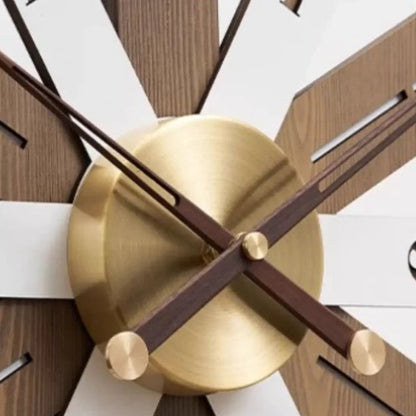 Modern Lounge Wall Clocks - Fremton: A mid-century-modern design with a brushed brass center, wooden and white spokes, and brass-and-wood hands, offering architectural elegance and timeless style.