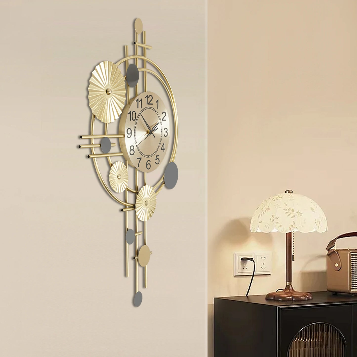 Oversized wall clock modern - Ashford: A stylish gold-tone wall clock with intersecting rods and concentric rings, featuring floating black numerals and silent brass hands, integrates artfully into the decor.