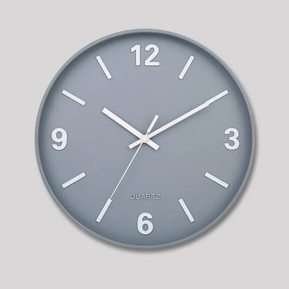Modern Silent Wall Clock - Densford features a grey face with large white numerals and bar markers, complemented by white hands, embodying minimalist elegance with a silent quartz movement, ideal for contemporary decor.