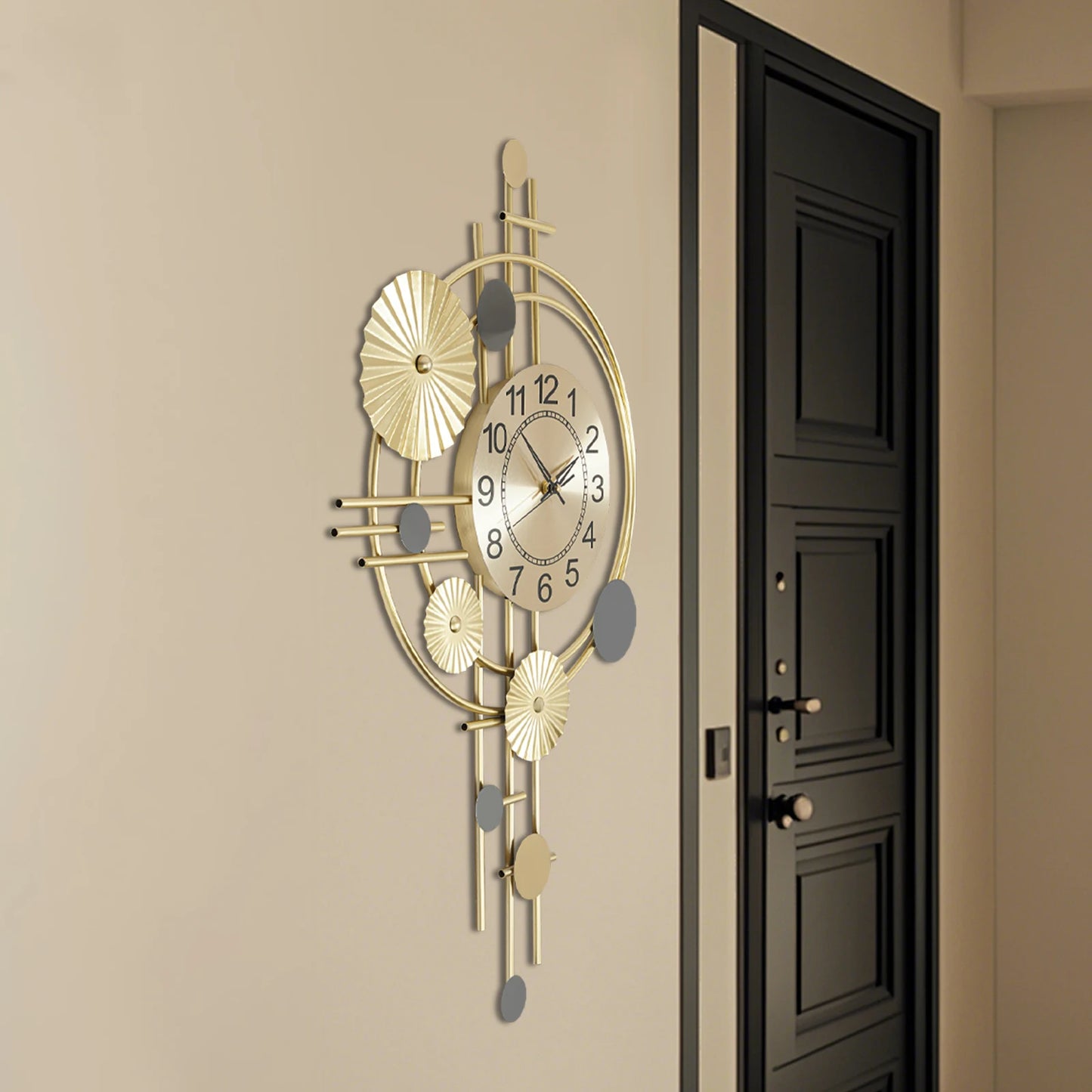 Oversized wall clock modern - Ashford: A 17.7 gold steel ring with floating black numerals and brass hands, featuring a sculptural design that integrates the wall color into its open-face dial.