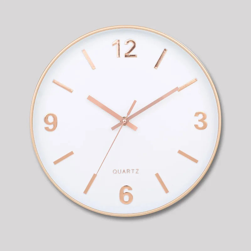 Modern Silent Wall Clock - Densford features a white face with rose-gold markers and hands, offering a sleek, minimalist design perfect for enhancing any room with its silent quartz movement.