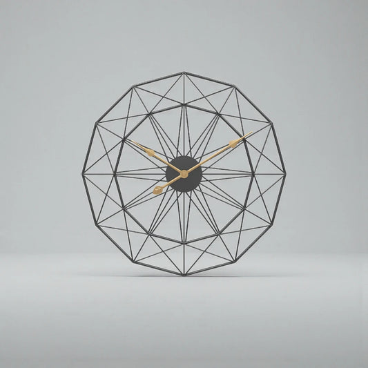 Modern Style Wall Clock - Blenford showcases a geometric black wire-frame forming interlocking triangles, centered with a black hub and three gold hands, epitomizing minimalist elegance and creative design.