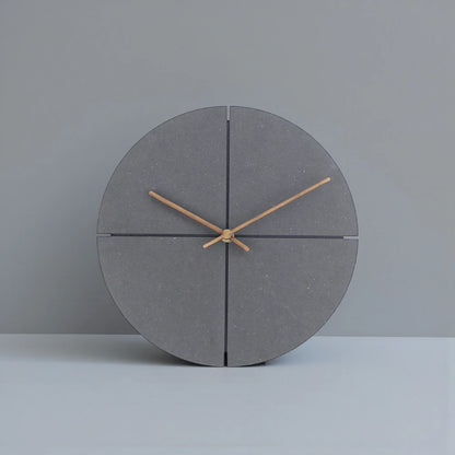 Deep Black Wall Clock Modern - Grenton features a minimalist dark-grey design with a circular face, slender hands, and a sophisticated stone-like finish, perfect for a modern urban aesthetic.