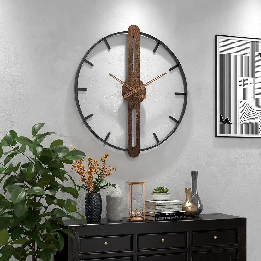 Modern Walnut & Steel Wall Clock by Largolck: A 27.6-inch open-face clock showcasing a metal ring with a wooden centerpiece and brass hands, atop a stylish console with vases and books.