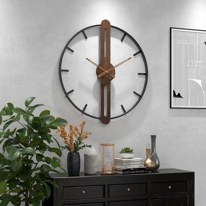 Modern Walnut & Steel Wall Clock by Largolck: A 27.6-inch open-face clock showcasing a metal ring with a wooden centerpiece and brass hands, atop a stylish console with vases and books.