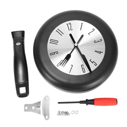 Frying Pan Wall Clock - Ashford: A playful clock styled as a pan with a silver dial and fork-and-knife hands, featuring a detachable handle and mounting kit, perfect for kitchen decor.