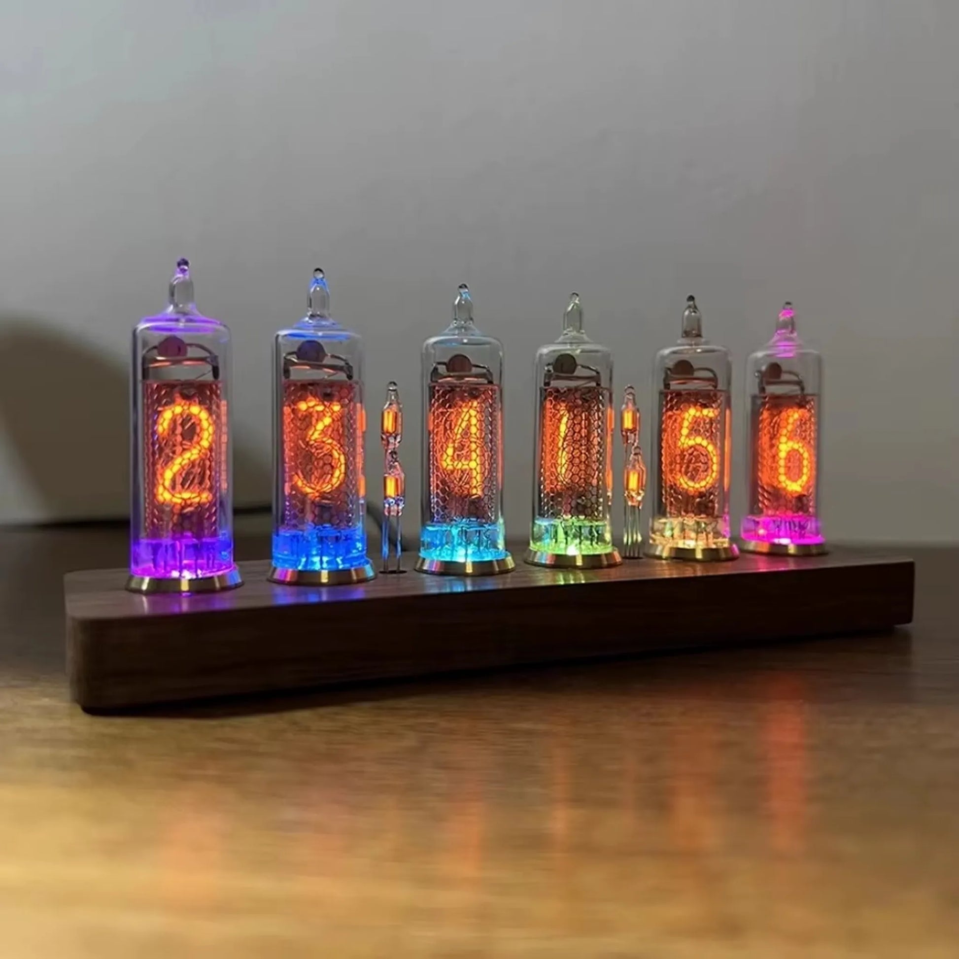 Nixie tube clock - Hartley: A mesmerizing vintage clock featuring six glowing glass tubes on a wooden base, showcasing the time 23:41:56 with neon accents, merging Soviet-era charm and modern design.