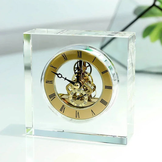 Crystal tabletop clock - Dunley: A transparent glass block showcasing gold gears, Roman numerals, and elegant black hands, perfect for adding modern elegance to desks or mantels.