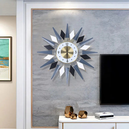 Big Decorative Wall Clocks - Denley: A striking style wall clock with a brass center and black, white, slate gray rays, perfect for adding a mid-century flair to modern decor.