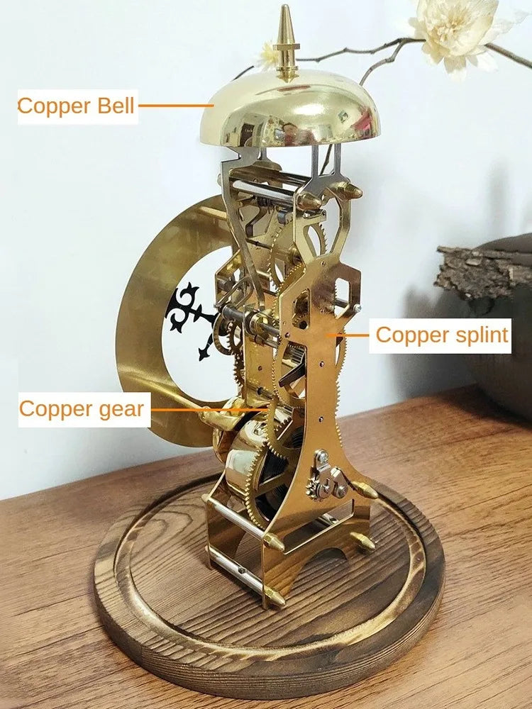 Glass dome clock - Stanley, featuring an exposed skeleton frame with copper gears, a top bell, and a winding barrel, elegantly showcasing its intricate mechanics on a wooden base.