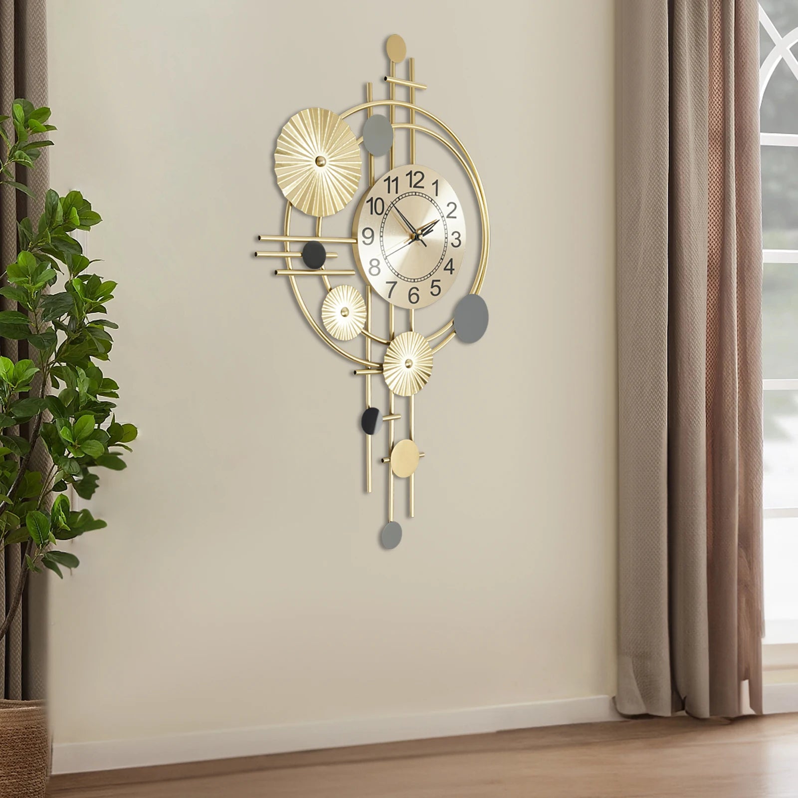 Oversized wall clock modern - Ashford features a gold-toned face with black numerals, brass hands, and a unique design of concentric rings and bars, set against a minimalist wall.