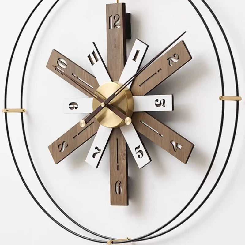 Modern Lounge Wall Clocks - Fremton: A contemporary design with a gold-tone hub, slim hands, and radiating wooden and white slats within a double-ring black metal frame, perfect for stylish interiors.