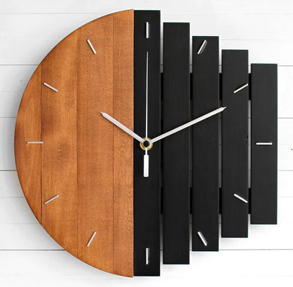 Modern wood wall clock - Clevor, featuring a semi-circular natural wood and black slatted design, with minimalist silver hands and metal hour markers, crafted from European linden wood for stylish spaces.