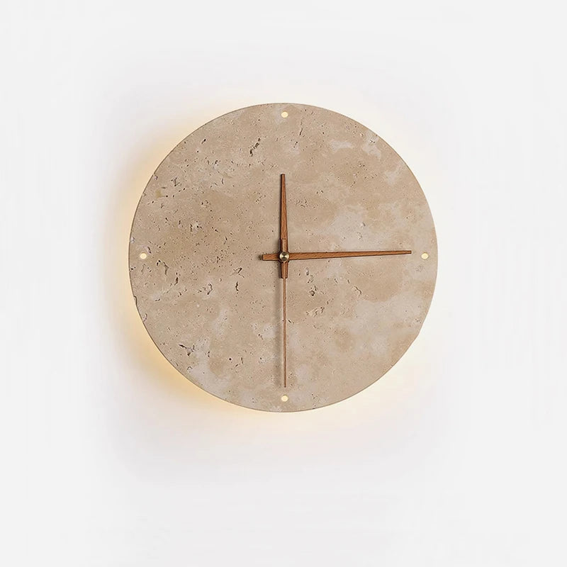Modern wall clock for living room - Torwyn features a travertine face with metal dots and brass hands, complemented by a warm LED halo, perfect for enhancing any space with minimalist elegance.
