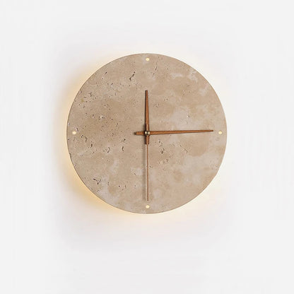 Modern wall clock for living room - Torwyn features a travertine face with metal dots and brass hands, complemented by a warm LED halo, perfect for enhancing any space with minimalist elegance.