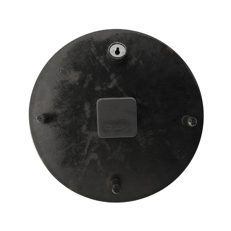 Back of the Bronze outdoor wall clock - Geneva, featuring a key-hole wall-mount slot and battery compartment, highlighting the clock's practical design for easy installation in any space.