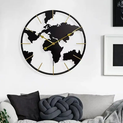 World Map Wall Clock - Claverton features a circular metal frame with continents in black silhouette and elegant gold hands, ideal for adding sophistication to any room.