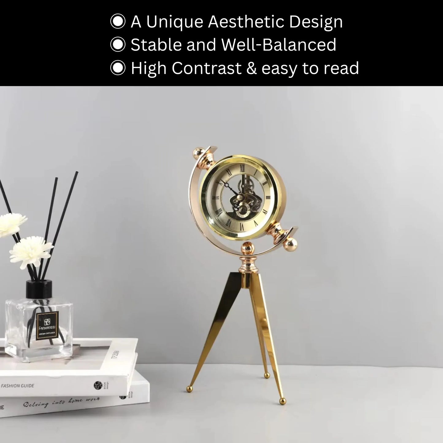 Vintage Table Clock - Gorven: A gold-tone mechanical clock with Roman numerals, suspended in a half-circle frame on tripod legs. Complements decor with its unique aesthetic design and easy-to-read face.
