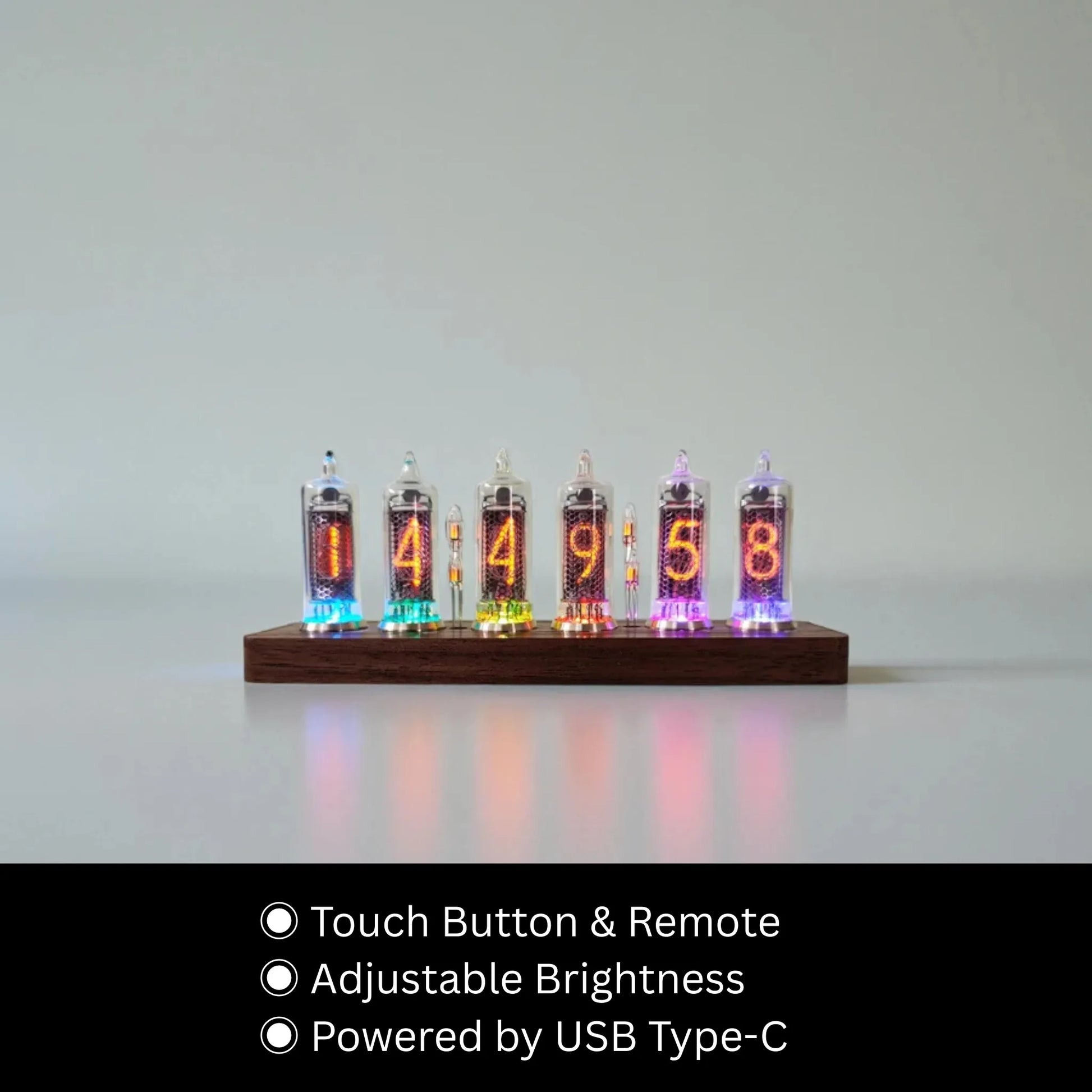 Nixie tube clock - Hartley: A sleek wooden base hosts six glowing glass tubes, displaying time with orange digits and RGB under-glow. Features touch-button control, adjustable brightness, and USB-C power.