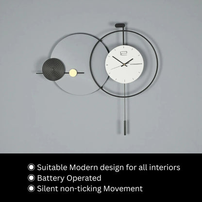 Big Wall Clock Modern - Darrington with a minimalist white face, black hands, overlapping metal rings, decorative spiral-disc, and pendulum weight; battery-operated and silent, ideal for modern interiors.