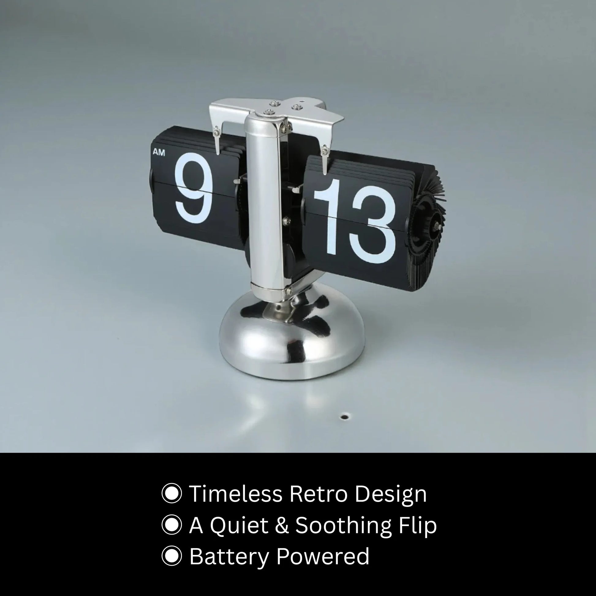 Retro flip clock - Jorrel, with polished metal base and flipping black cards displaying 9:13 AM, embodies timeless retro design, offering a quiet, gear-operated charm for modern homes or offices.